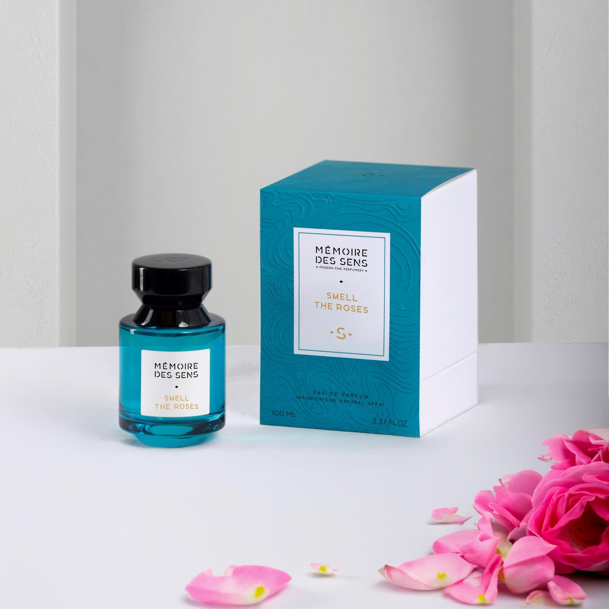 Smell the Roses – Eau de Parfum packaging with a pink flower